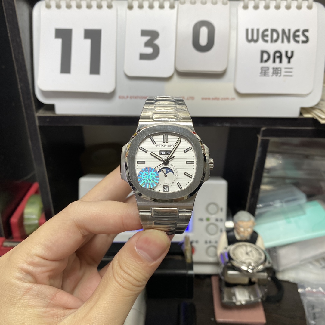 Patek Philippe Nautilus series 57261A-010, White Dial, Complete Month Day Date and Moon Phase Functions, 40.5mm Size.
