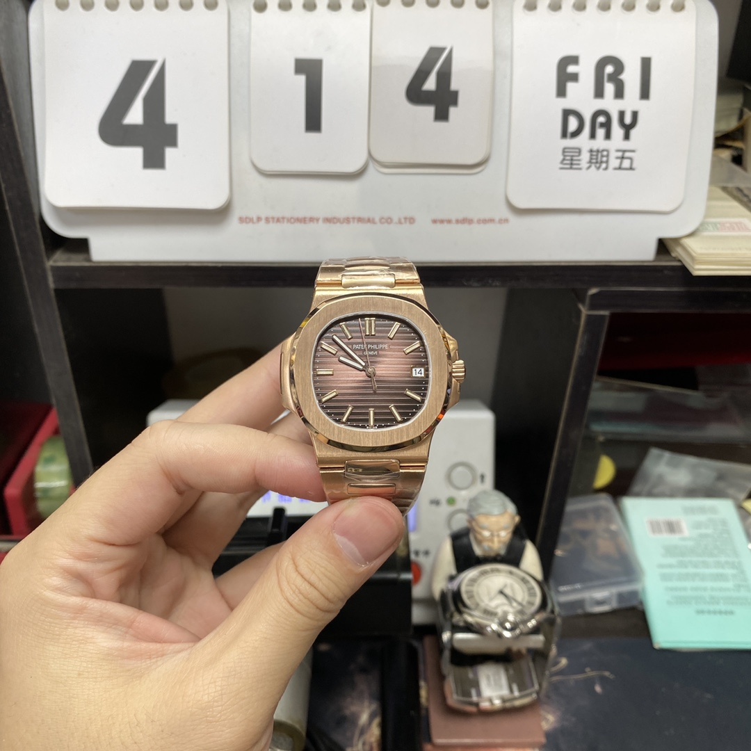 Patek Philippe Nautilus series 57111R-001, Coffee Dial Rose Gold Case Steel Bracelet, 40mm size.