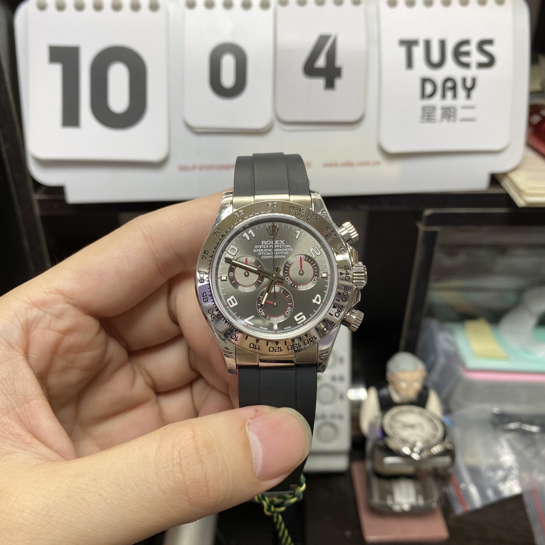 Rolex Cosmograph Daytona Series 116519-0104, Grey Dial with Red Hands Roman Numerals, 40mm size.