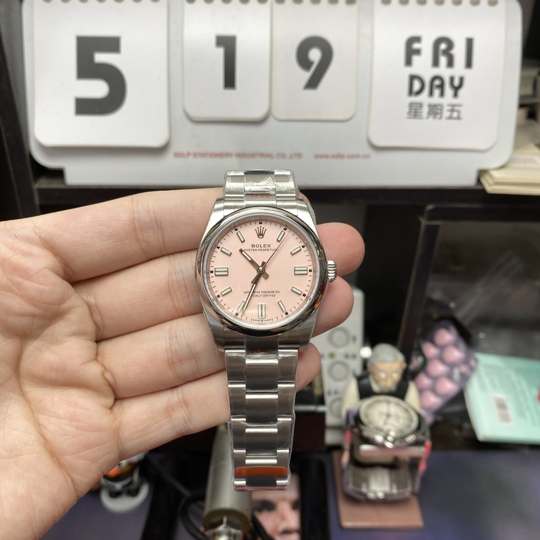 Rolex Oyster Perpetual Series m126000-0008, Pink Dial, 36mm size.