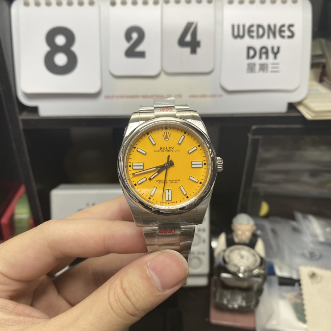 Rolex Oyster Perpetual Series m124300-0004, Yellow Dial, 41mm size.