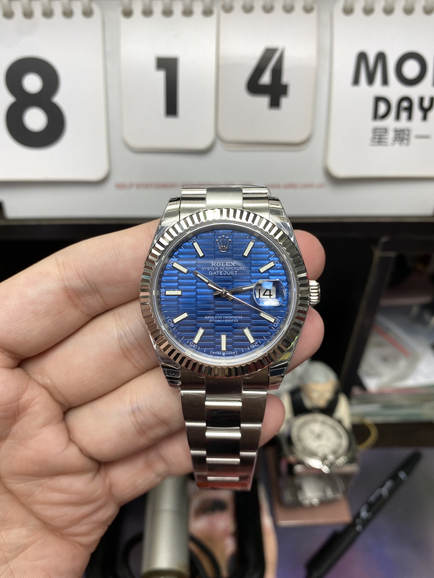 Rolex Datejust Series m126334-0031, Blue Checkered Dial Fluted Bezel, 41mm size, Jubilee Bracelet.