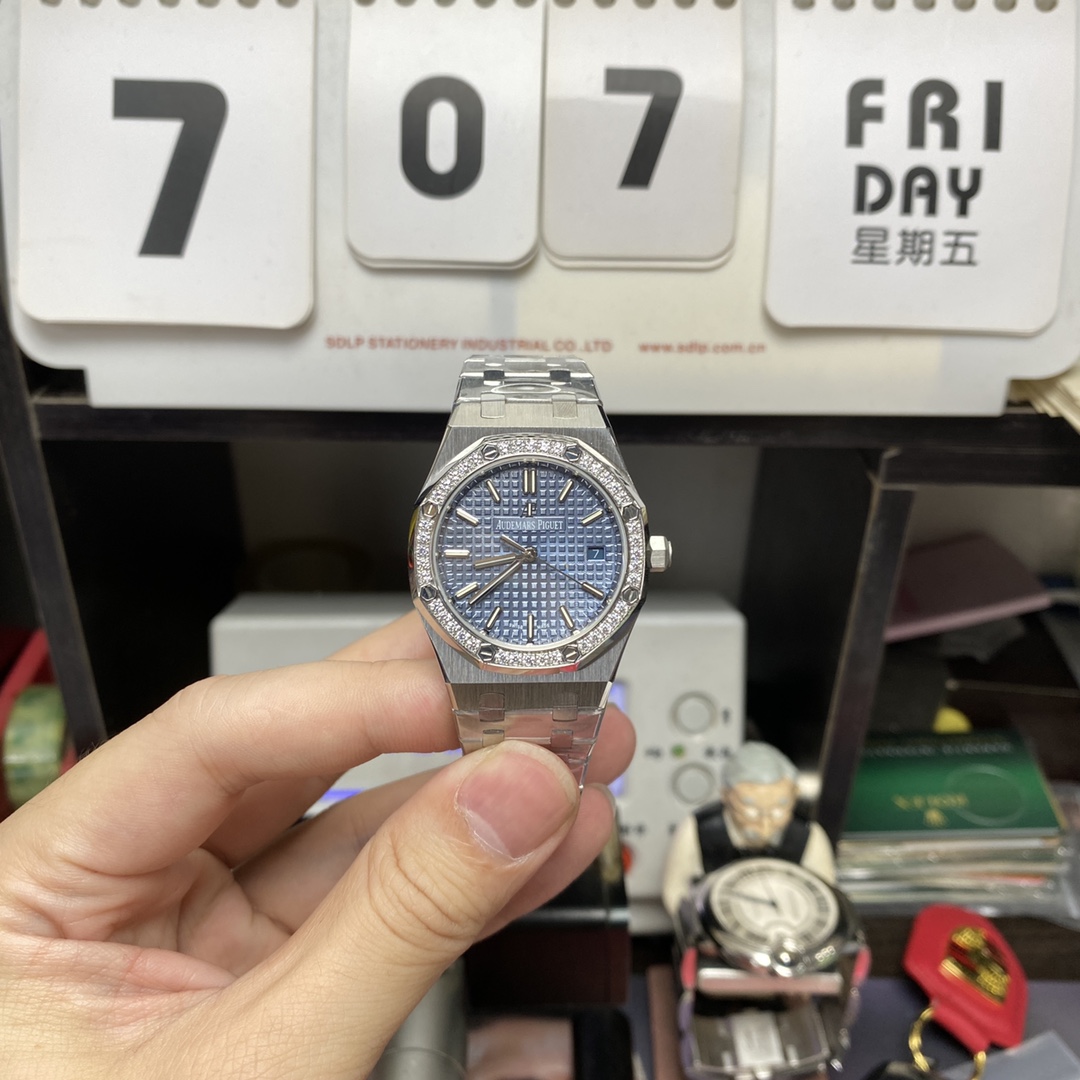 Audemars Piguet Royal Oak Offshore Series 77451ST.ZZ.1361ST.04, Blue Dial Gem-Set Bezel Mechanical Movement, 34mm Size.